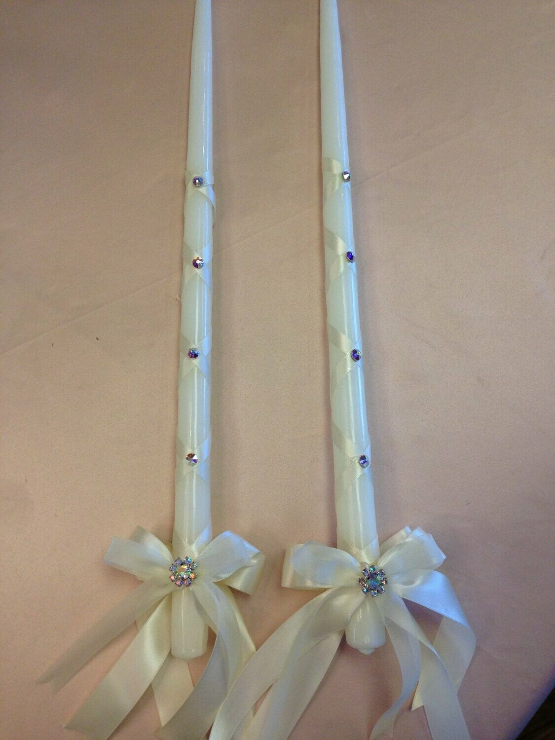 Criss cross ribbon wedding candles