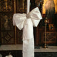 Silk bows and brooch wedding candles