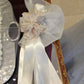 Brooch and floral bow wedding candles