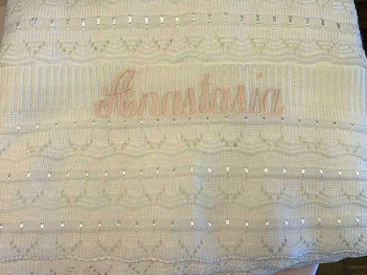 Embroidered knit blanket